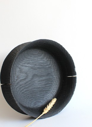 Black wooden dish for fruit, decorative candy dish