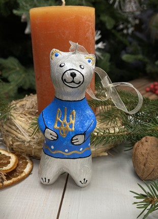 Sculpture figurine Bear in a sweater with Ukrainian trident