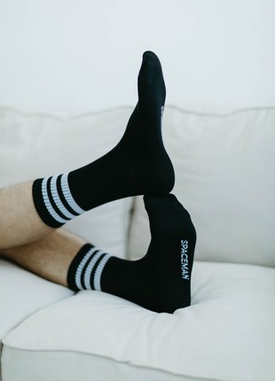 Black socks with white stripes