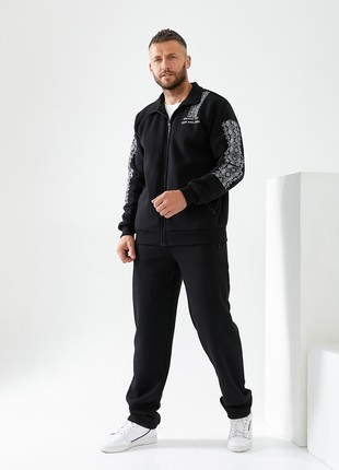 A men's warm knitted suit with an ornament, hood, and stand-up collar