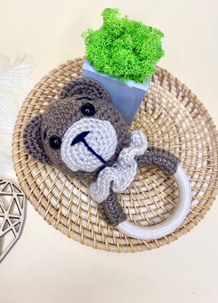 Knitted rattle toy - Bear on a wooden ring