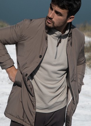 The jacket is beige