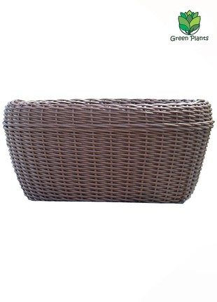 A large pot of 60 l for flowers and plants, a pot made of artificial rattan, handmade.
