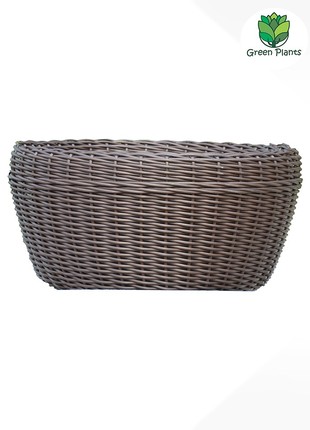 A large pot of 60 l for flowers and plants, a pot made of artificial rattan, handmade.