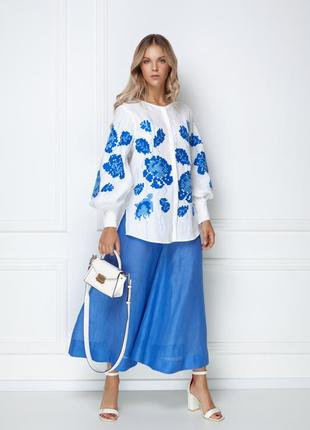 "camelia" blue and white blouse