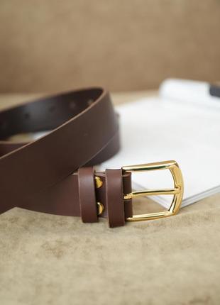 Leather belt with gold buckle1 photo