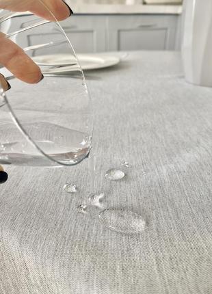 Teflon coated tablecloth ø140 cm for a round table4 photo