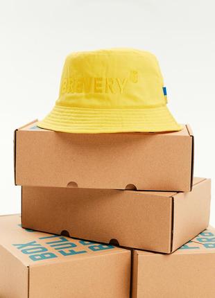 BRAVERY IS IN OUR DNA Yellow Bucket Hat