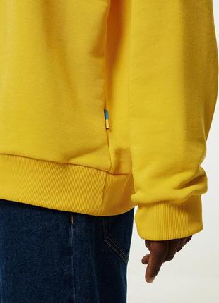 BRAVERY IS IN OUR DNA Yellow Sweatshirt2 photo