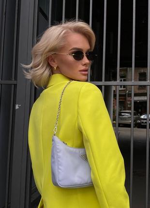 Woman neon yellow blazer2 photo