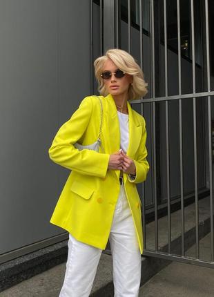 Woman neon yellow blazer1 photo