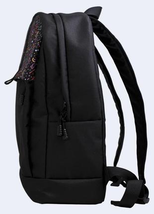 Black backpack with colored shapes2 photo