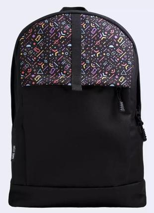 Black backpack with colored shapes