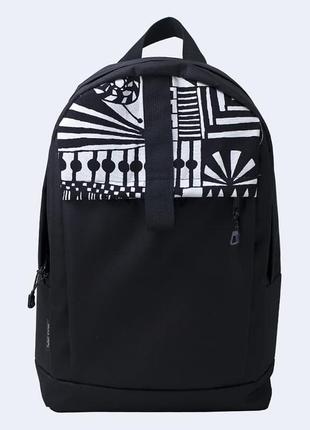 Black backpack with white ornament1 photo