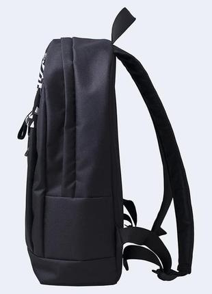 Black backpack with white ornament2 photo