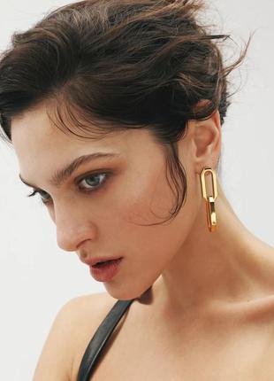 Earrings with beveled faces