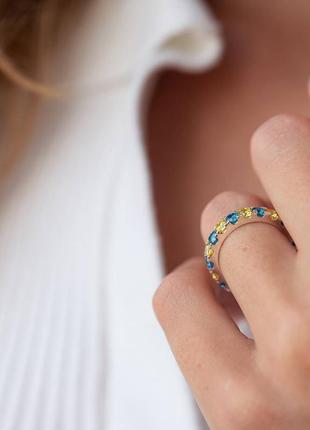 Sterling Silver Ring With a Path of Blue and Yellow Stones 1126646 photo