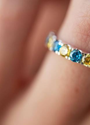 Sterling Silver Ring With a Path of Blue and Yellow Stones 1126644 photo