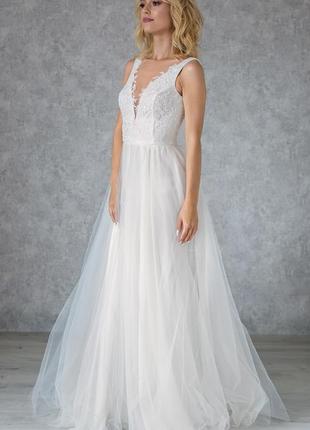 Bohemian Wedding Dress With Floral Decor and Pearl Buttons6 photo