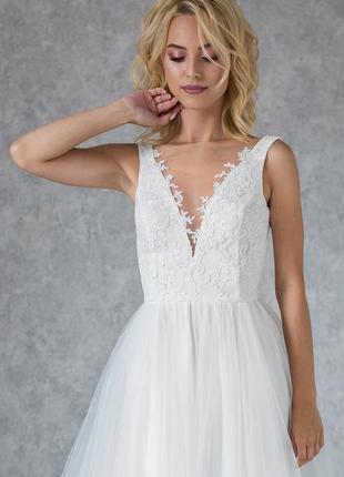 Bohemian Wedding Dress With Floral Decor and Pearl Buttons5 photo