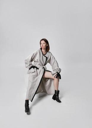 Linen coat with contrasting braid and volume sleeves with ties