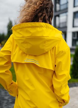 Casual Women's Yellow Travel Raincoat by Parasol'ka9 photo