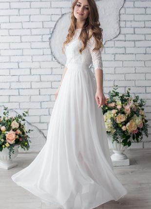 Ivory wedding dress with lace top and sleeves1 photo