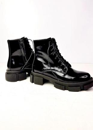 Black boots in patent leather4 photo