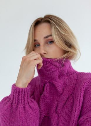 Pink hand-knitted sweater