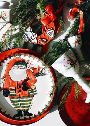 Christmas handmade ceramic plate Santa with a bag of gifts New Year 20233 photo