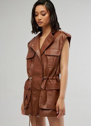 Lined eco-leather vest