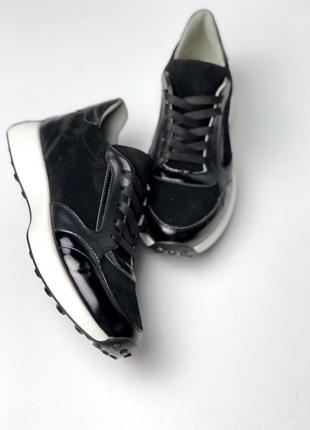 Black mixed sneakers in natural materials