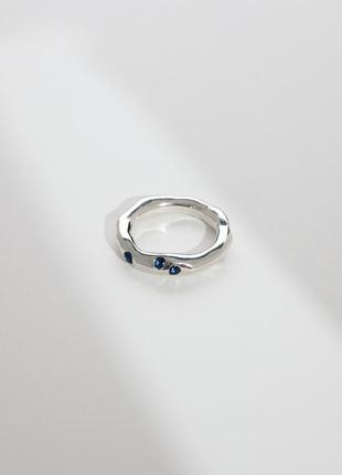 Irregular sterling silver ring with blue stone1 photo