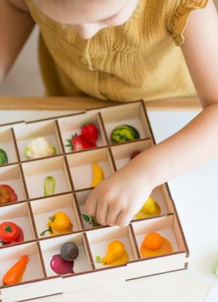 Montessori sorting toy with miniature vegetables and fruits6 photo