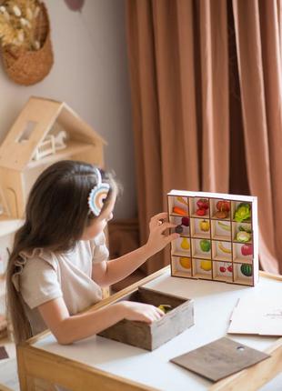 Montessori sorting toy with miniature vegetables and fruits7 photo