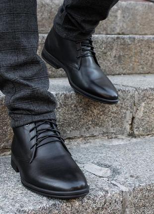 Stylish classic winter shoes IKOS for men. Black men's boots on fur1 photo