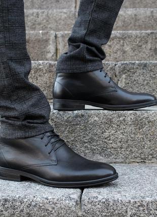 Stylish classic winter shoes IKOS for men. Black men's boots on fur6 photo