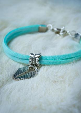 Suede bracelet - amulet with pendant "wings"6 photo