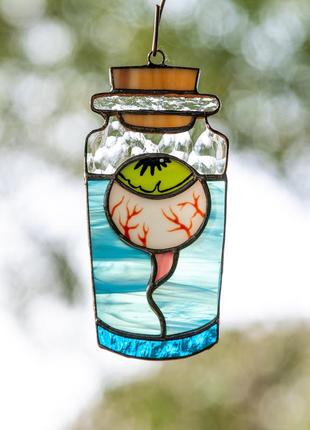 Creepy  eye in the bottle stained glass window hangings