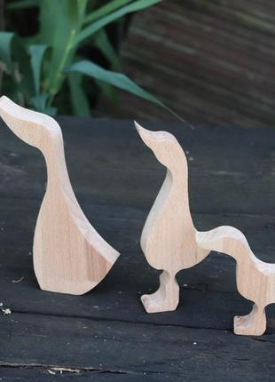 Wooden scandinavian toy family of ducks
