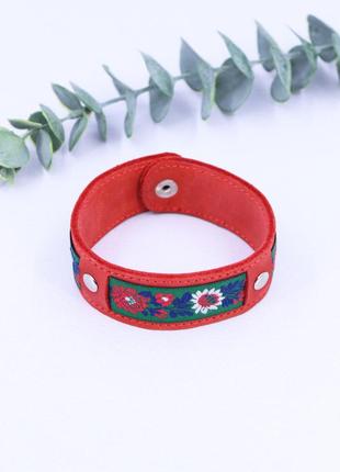 Red leather cuff bracelet with fabric insert on metallic button