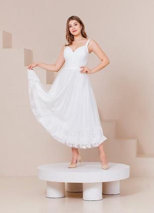 Elegant milky midi dress with a tulle skirt1 photo
