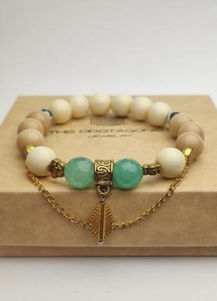 Bracelet with golden charms and natural stones4 photo