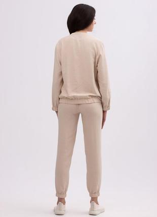Beige trousers made of viscose linen of a free cut 71522 photo