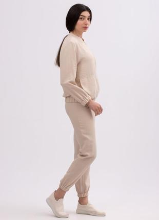 Beige trousers made of viscose linen of a free cut 71523 photo