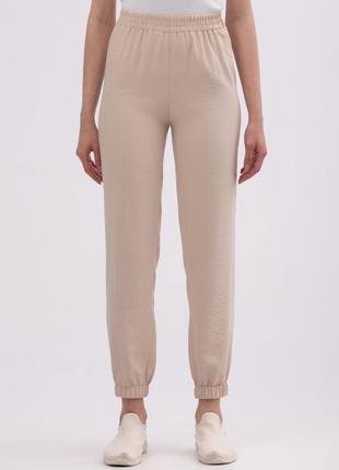 Beige trousers made of viscose linen of a free cut 71524 photo