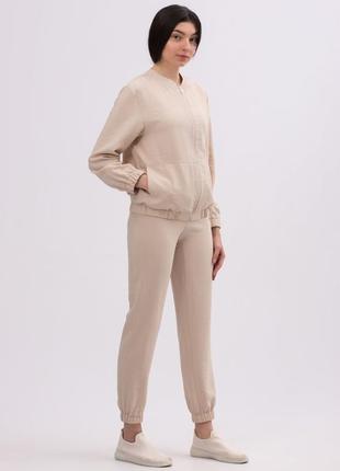 Beige trousers made of viscose linen of a free cut 71525 photo