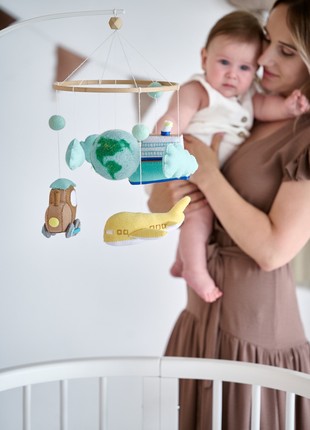 Musical baby mobile with bracket, Baby mobile "Travel"1 photo