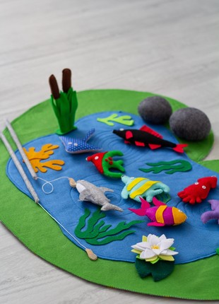 Toddler fish game with fishing pole