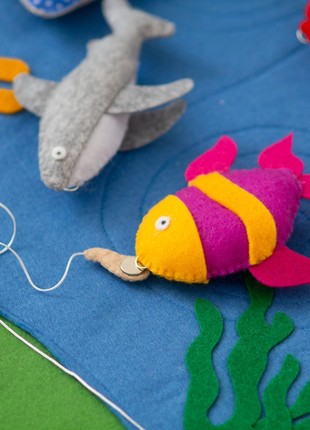 Toddler fish game with fishing pole9 photo